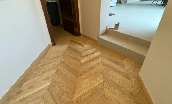 Pose d'un parquet massif en point de Hongrie à Lissieu , Lyon 06, Atelier Céramique & Bois